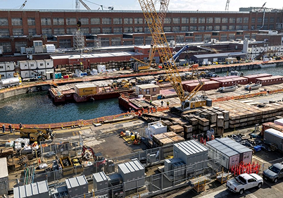Aerial view of a shipyard with containers.